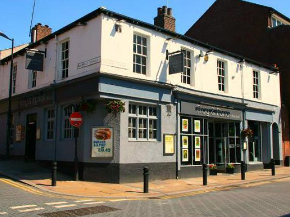 Exterior of The Frog and Parrot pub.