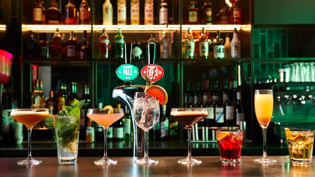 Several cocktails lined up on the bar at The Light Cinema.