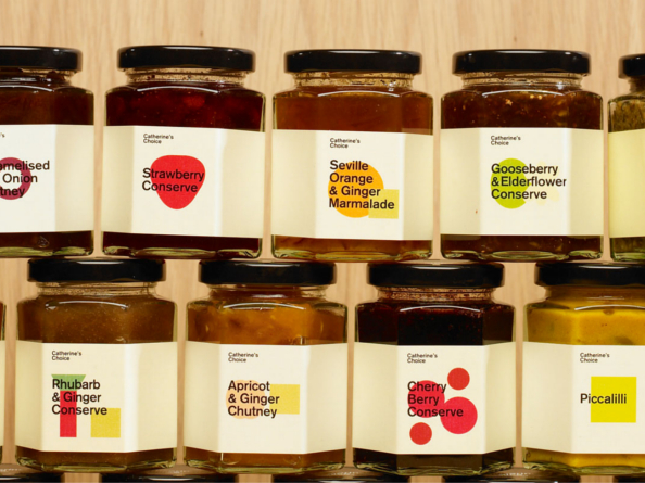 Two rows of jam jars, stacked on top of each other.