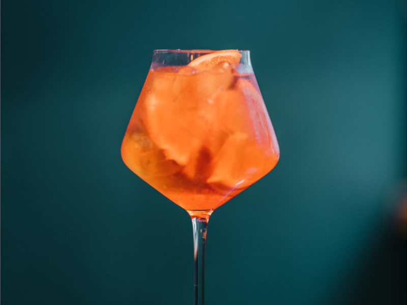 An orange cocktail.