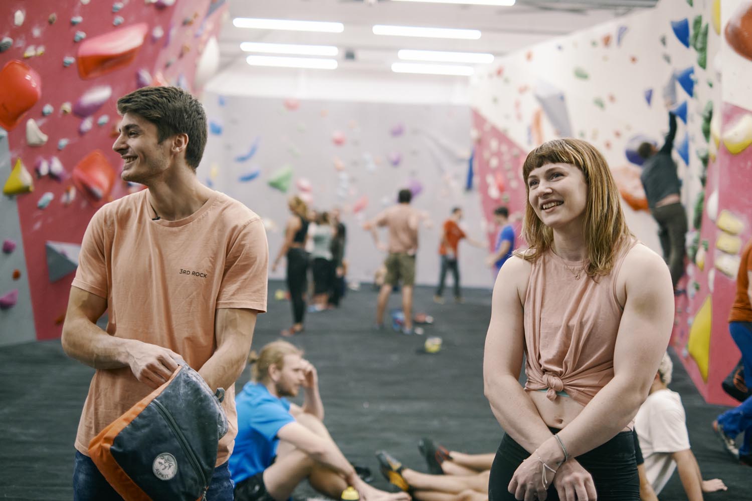 Two people getting ready to climb at The Climbing Hangar.