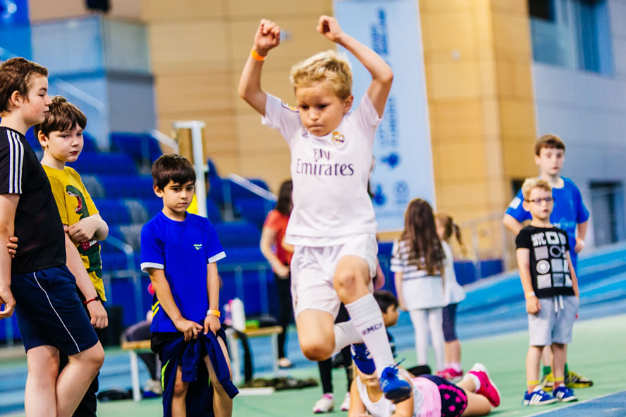 Young people taking part in Atheletics events at the  English Institute Of Sport.