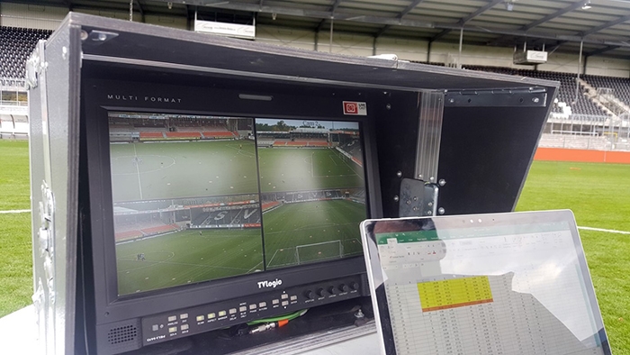 Offside VAR Technology set up next to a football pitch.