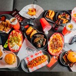 A table full of American style food at FirePit Rocks Bar and BBQ.