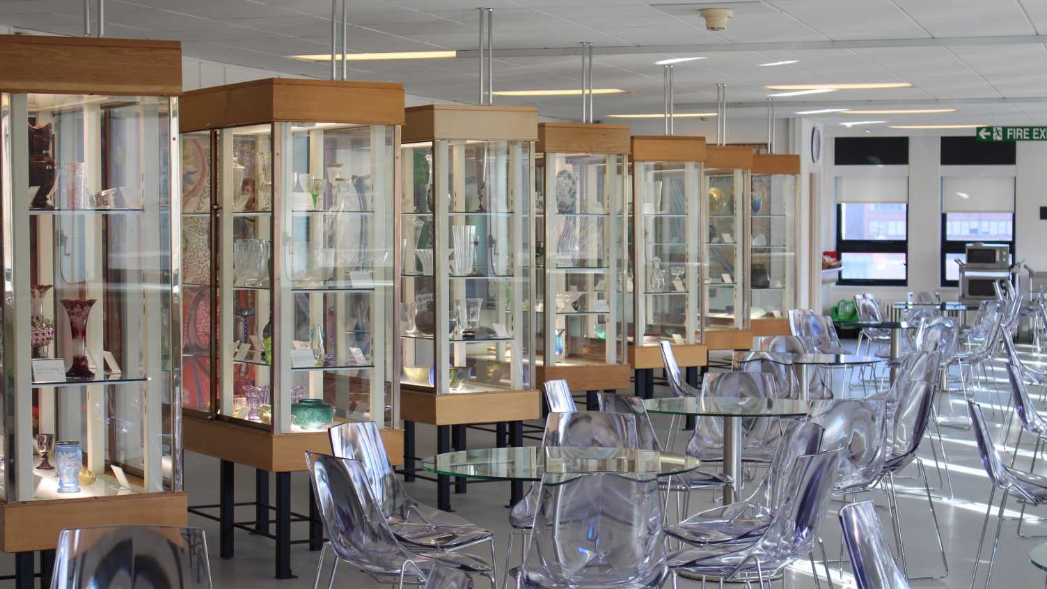 Rows of display cabinets at the Turner Museum Of Glass.