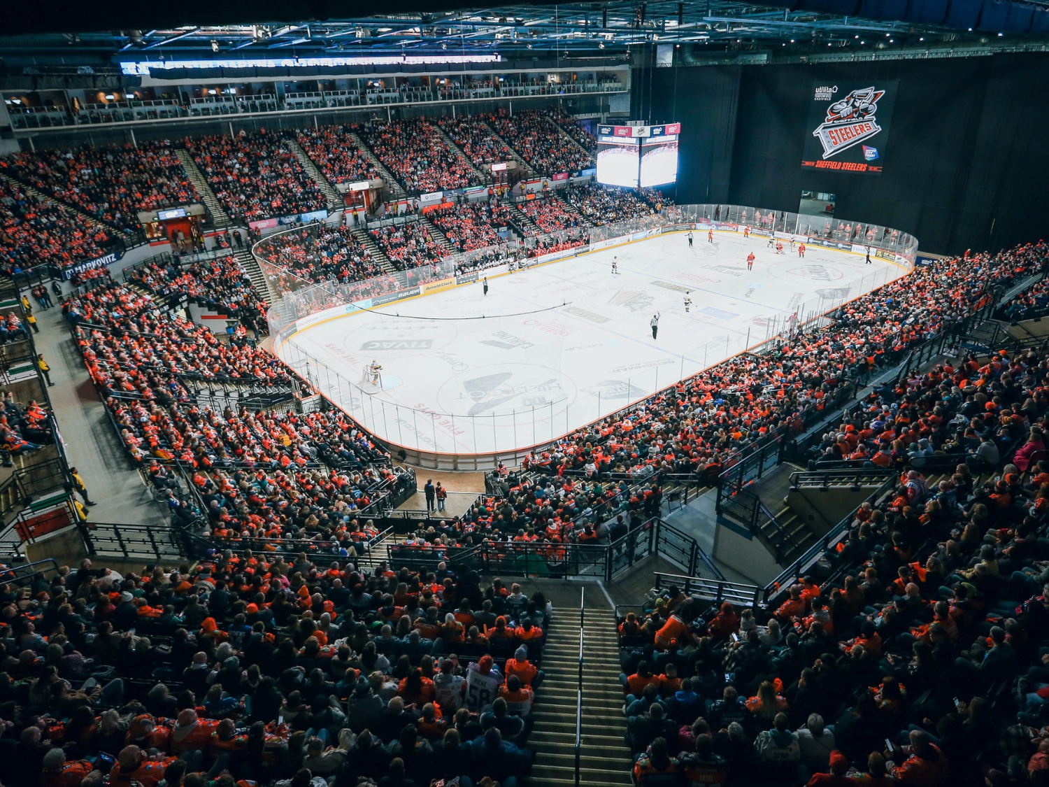 An ice hockey game in full swing at ta Arena Sheffield.