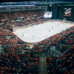 An ice hockey game in full swing at ta Arena Sheffield.