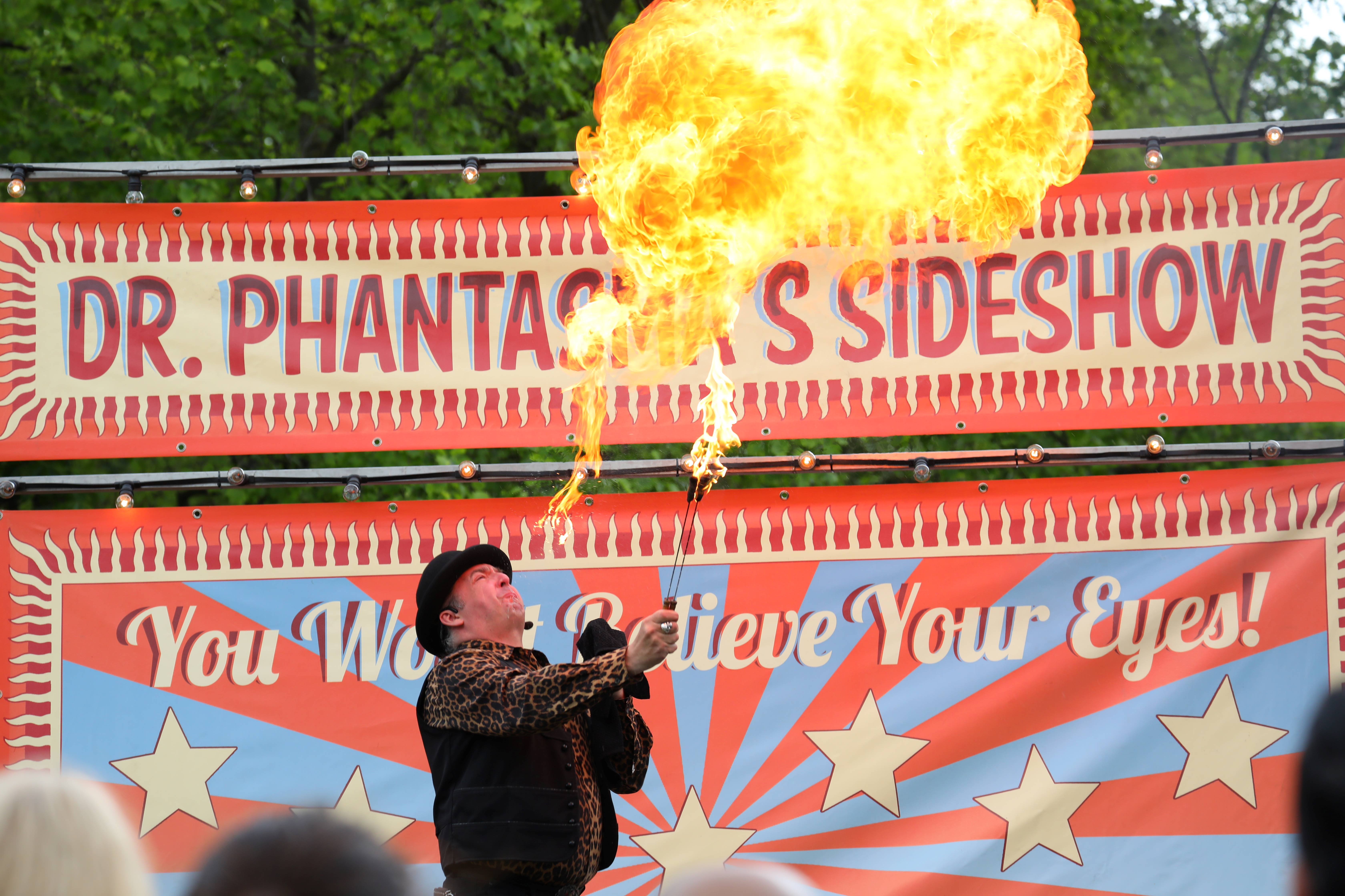 A man breathes fire at a previous Weston Park May Fayre.