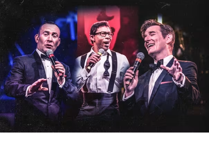 Promotional poster for the show featuring the three performers, all singing into microphones.