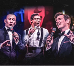 Promotional poster for the show featuring the three performers, all singing into microphones.