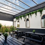 Tables out side at the Peaks Sports Bar & Snooker Club.