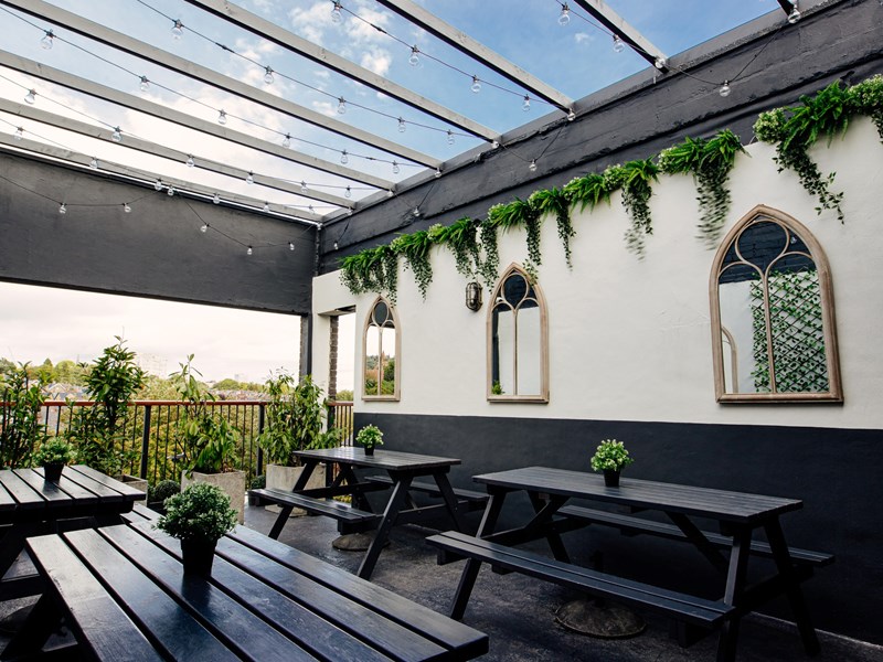 Tables out side at the Peaks Sports Bar & Snooker Club.