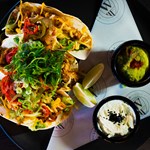 A plate full of tacos at The Wildcard Bar & Grill.