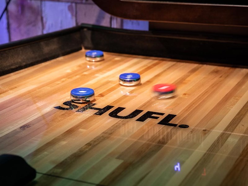 Shuffle board at Lane7