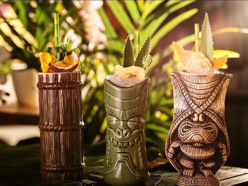 Cocktails in Tiki style cups at the Bamboo Door.