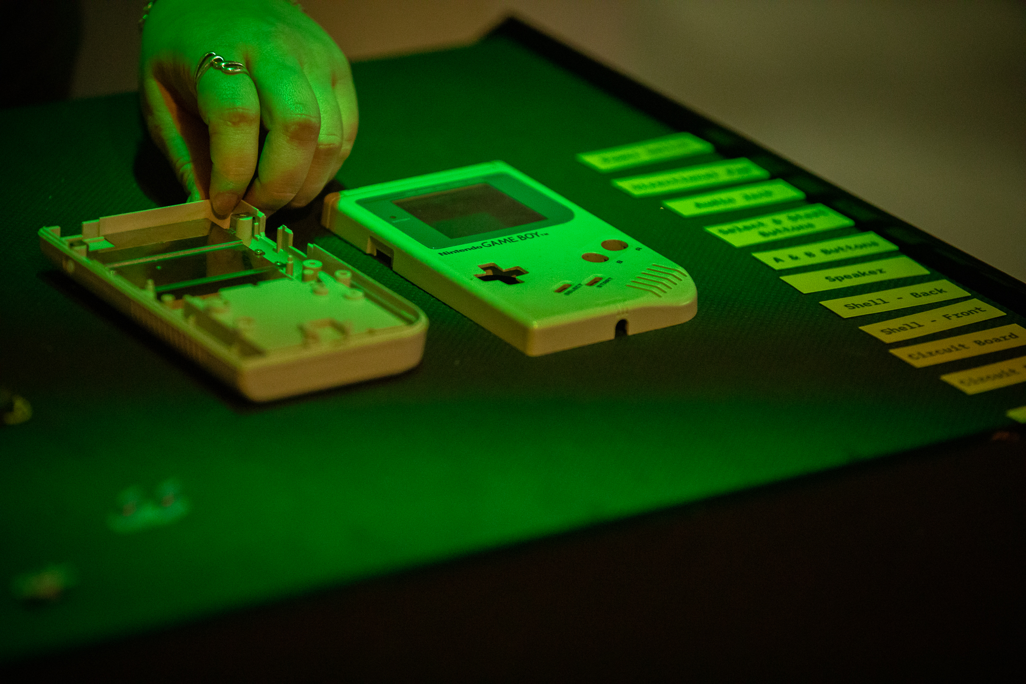 An original GameBoy that has been opened up, on display at The National Videogame Museum