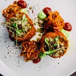 A fancy dish on a white plate.