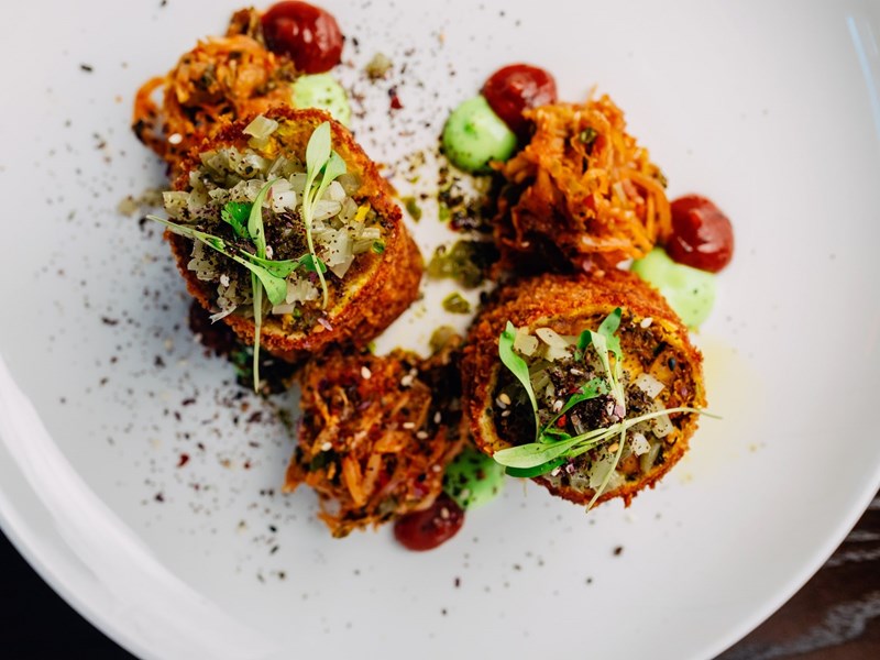 A fancy dish on a white plate.