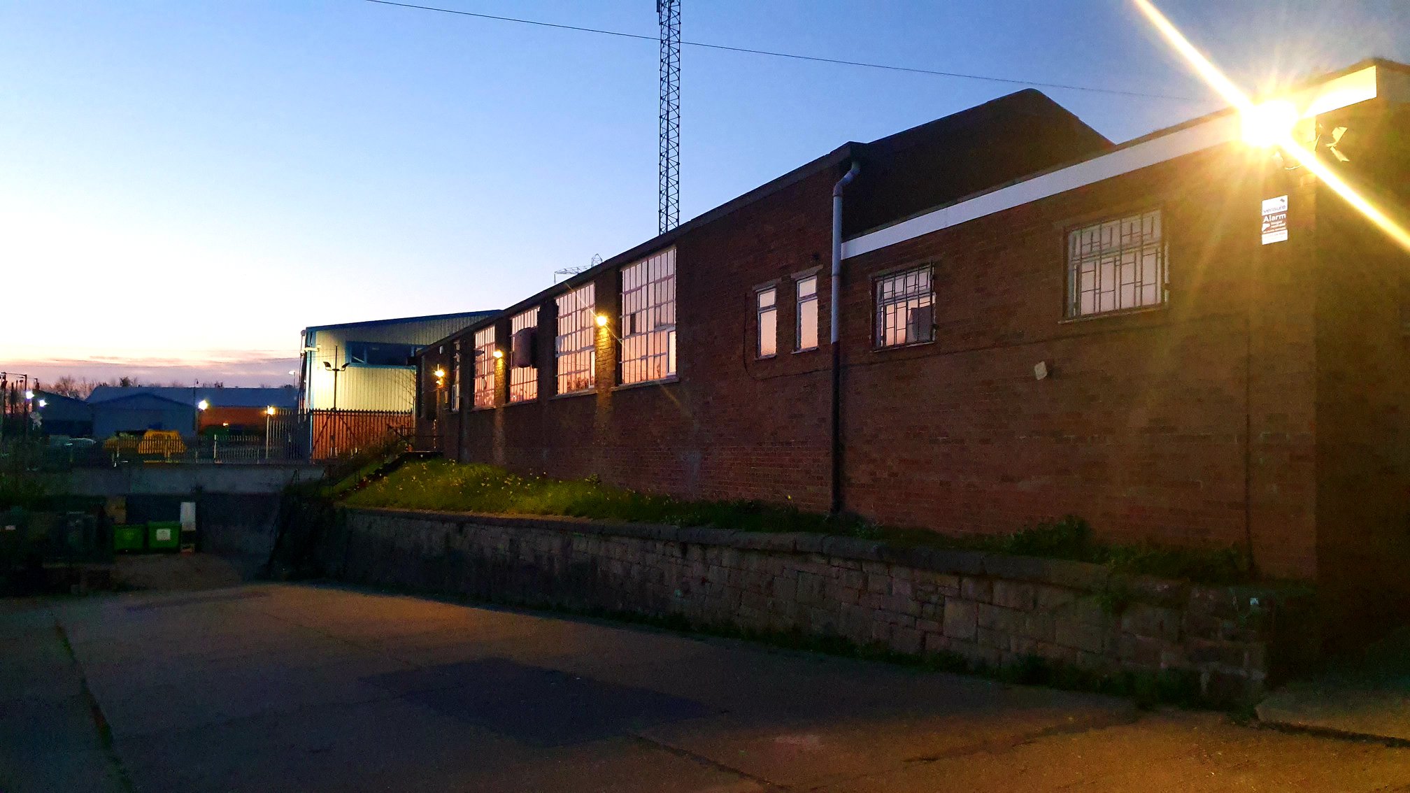 The exterior of Dryad Works at sunset.