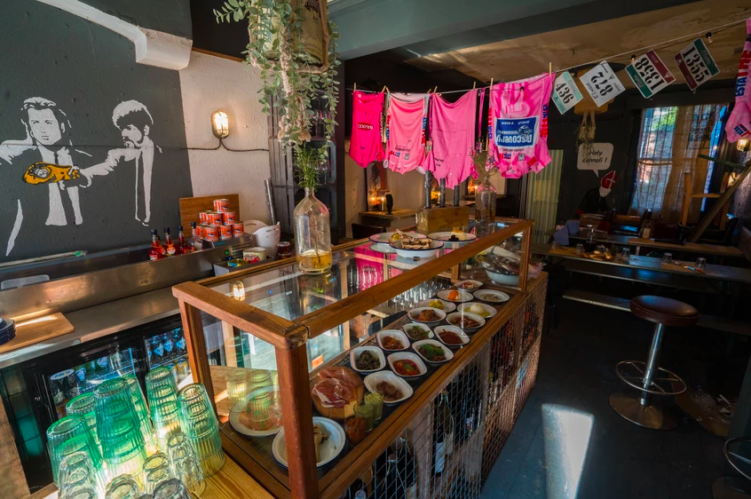 The counter at North Town, with a glass case filled with goods for sale.