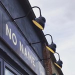 The sign above an entrance read 'No Name'.