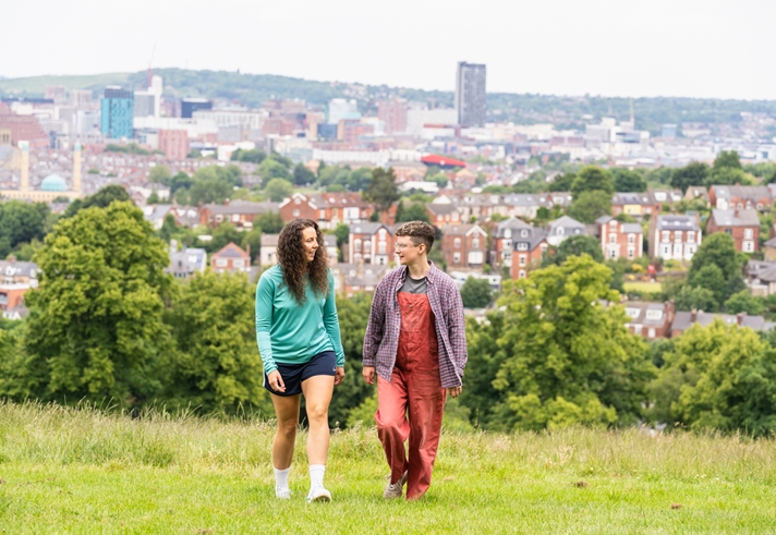 Two people exploring Sheffield'a Green Space At Meersbrook Park.