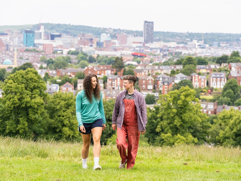 Two people exploring Sheffield'a Green Space At Meersbrook Park.