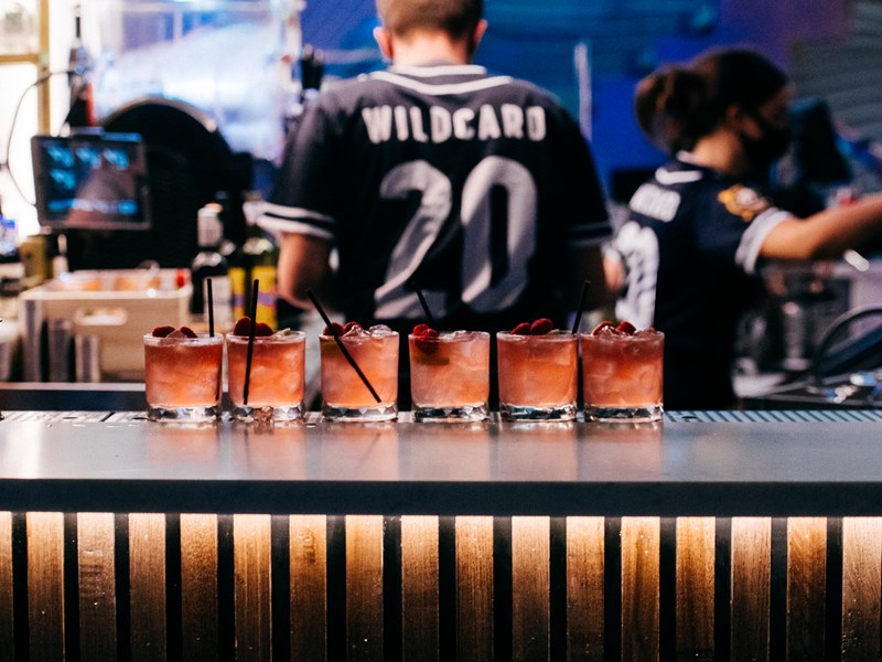 Staff making cocktails at The Wildcard Bar & Grill.