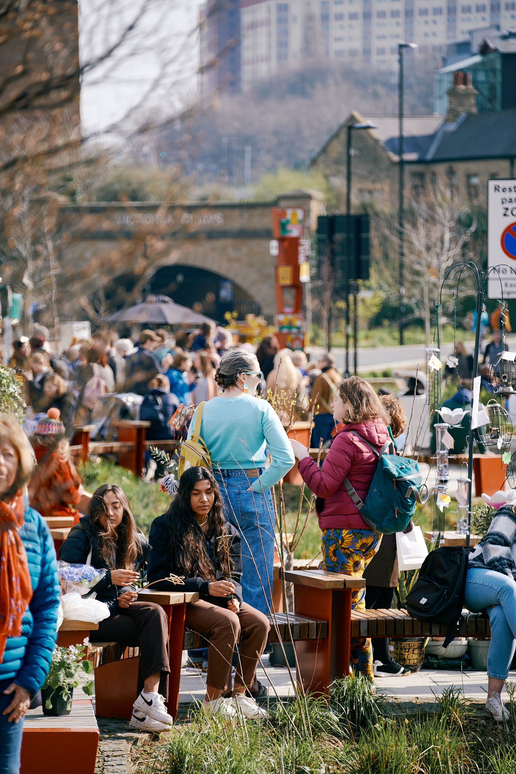 A crowd of people at the outdoor Pollen Market in Sheffield city centre.