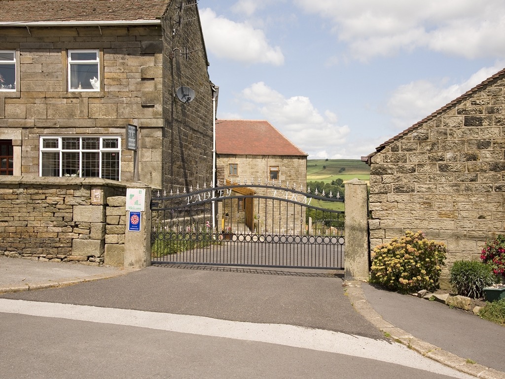 Padley Farm – exterior view with driveway leading to the entrance.