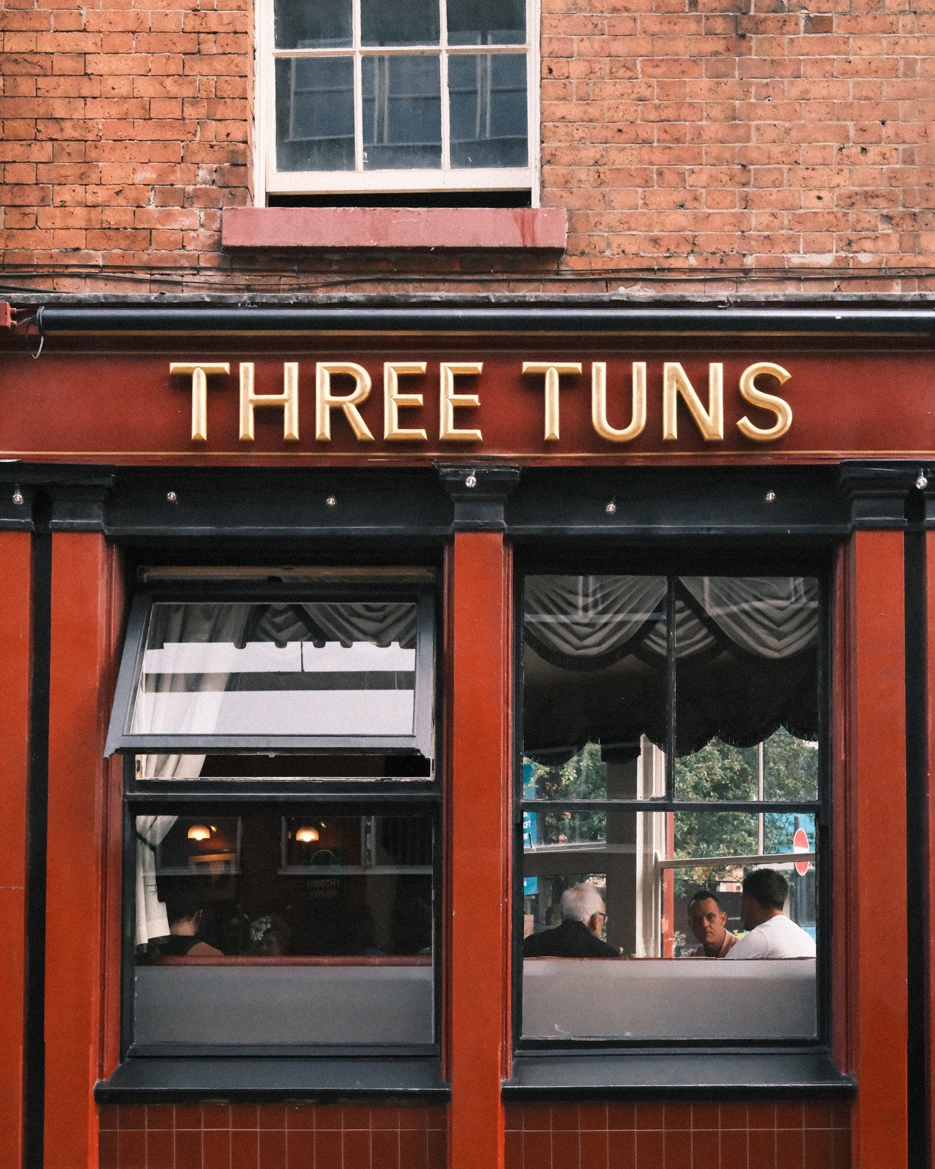 Exterior of The Three Tuns looking through the window