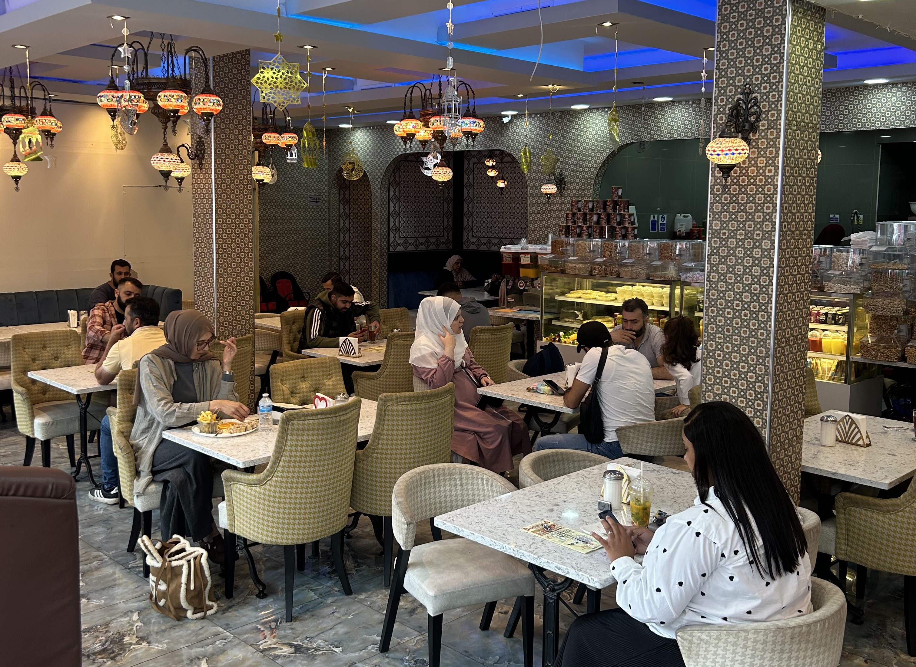 People dining at  Damascus Bakery and Sweets.