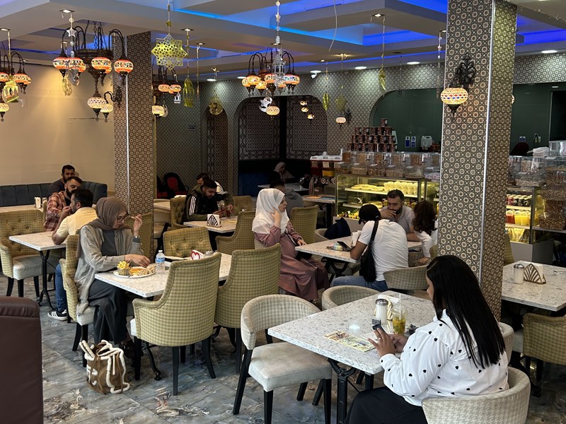 People dining at  Damascus Bakery and Sweets.