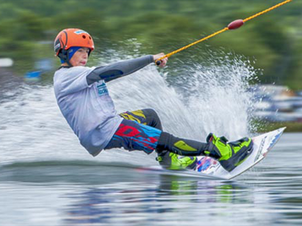 A person water skiing on a lake.