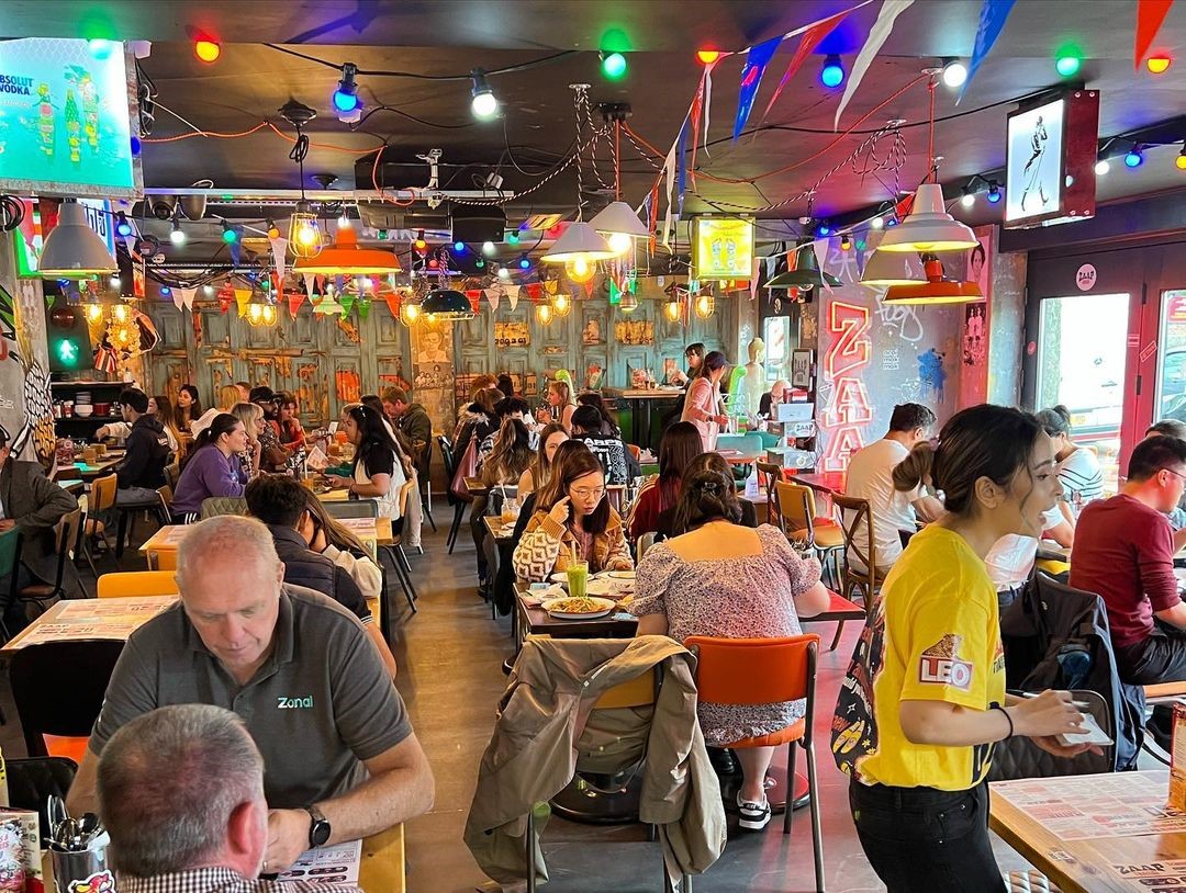 Tables filled with customers at Zaap Thai Street Food.