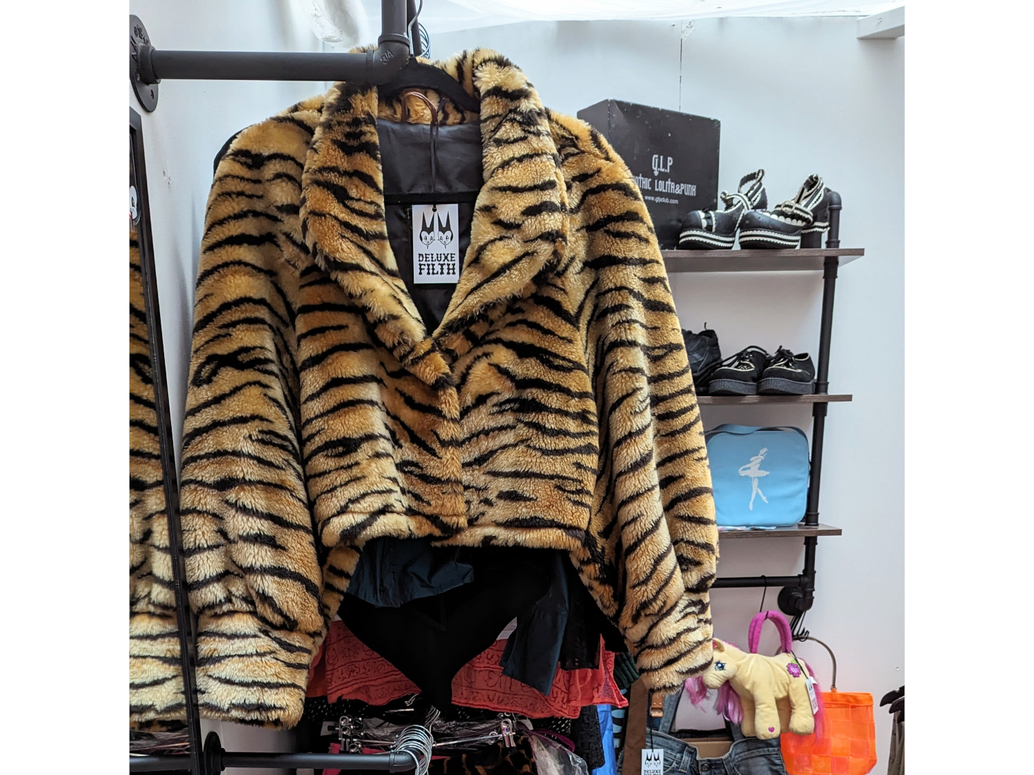A fake tiger skin coat for sale in the Red Brick Market.