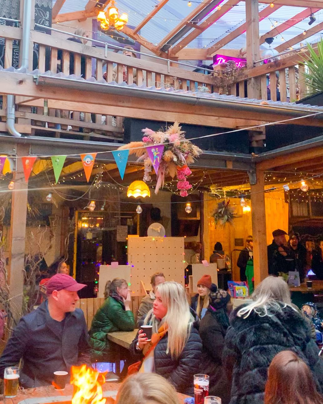 The courtyard at Hagglers Corner, filled with people celebrating.