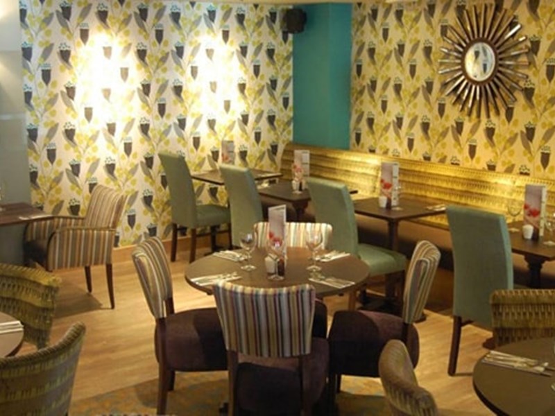 Premier Inn – restaurant with soft seating area for casual dining.