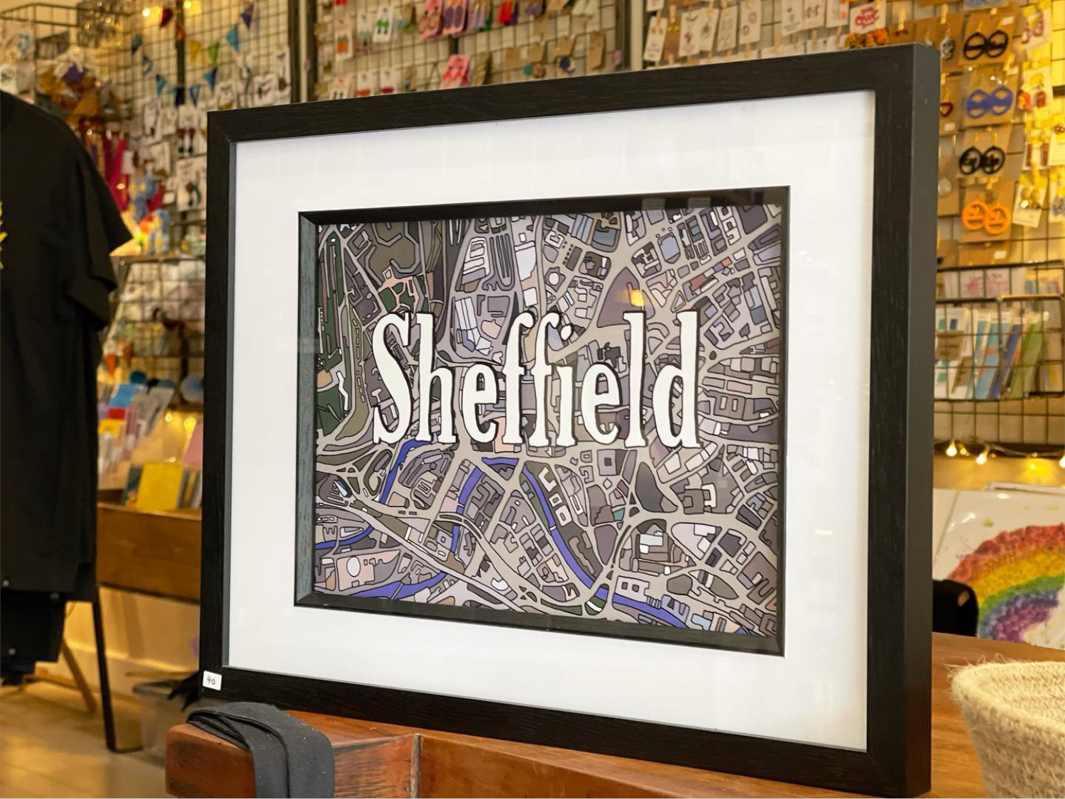 A framed picture of a hand-drawn map of Sheffield at Annie Jude's