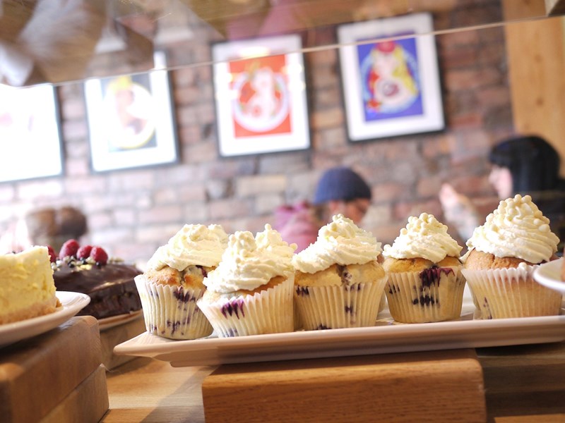 A row of cupcakes on the counter at Made by Jonty.